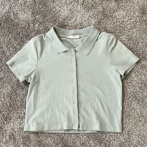 Light green cropped button up shirt